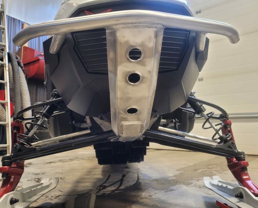 Custom fabrication for snowmobile bumper.