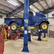 1936 Chevy up on the two post lift.